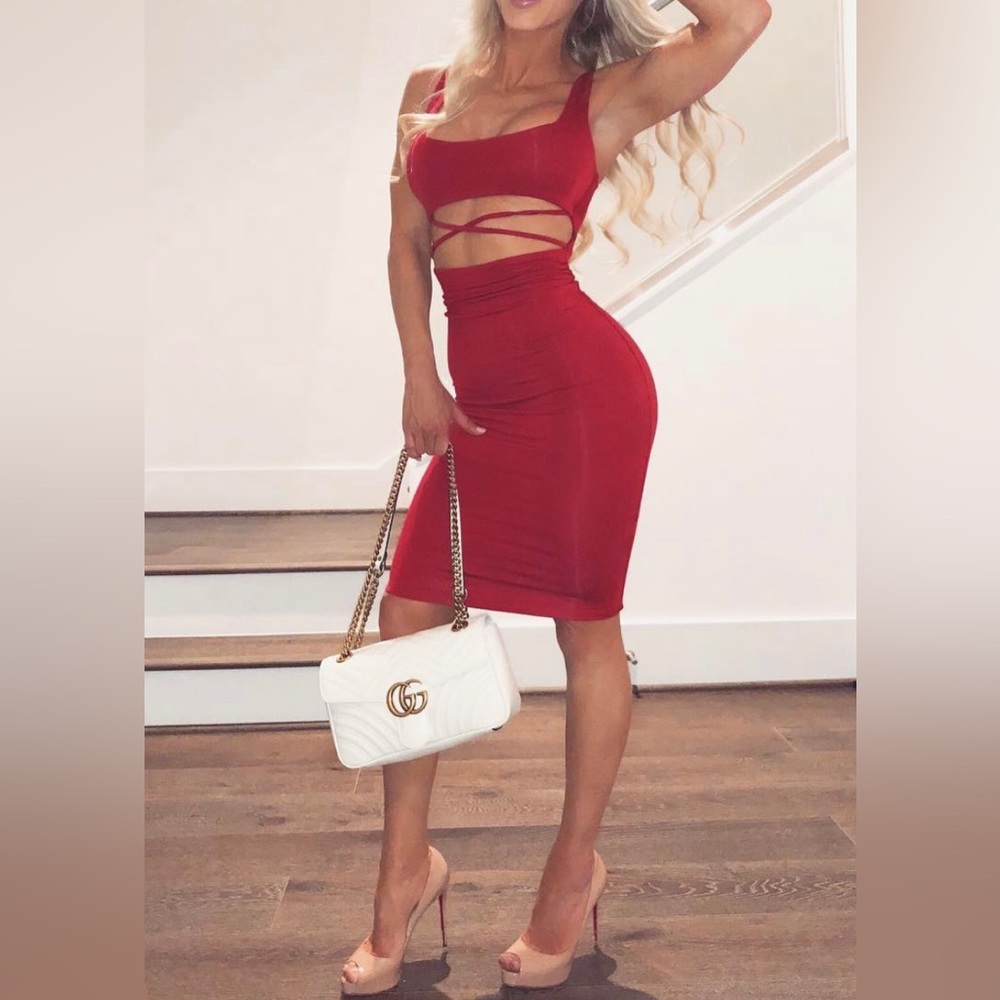 Figure-hugging bodycon red dress size 6. No longer available online.